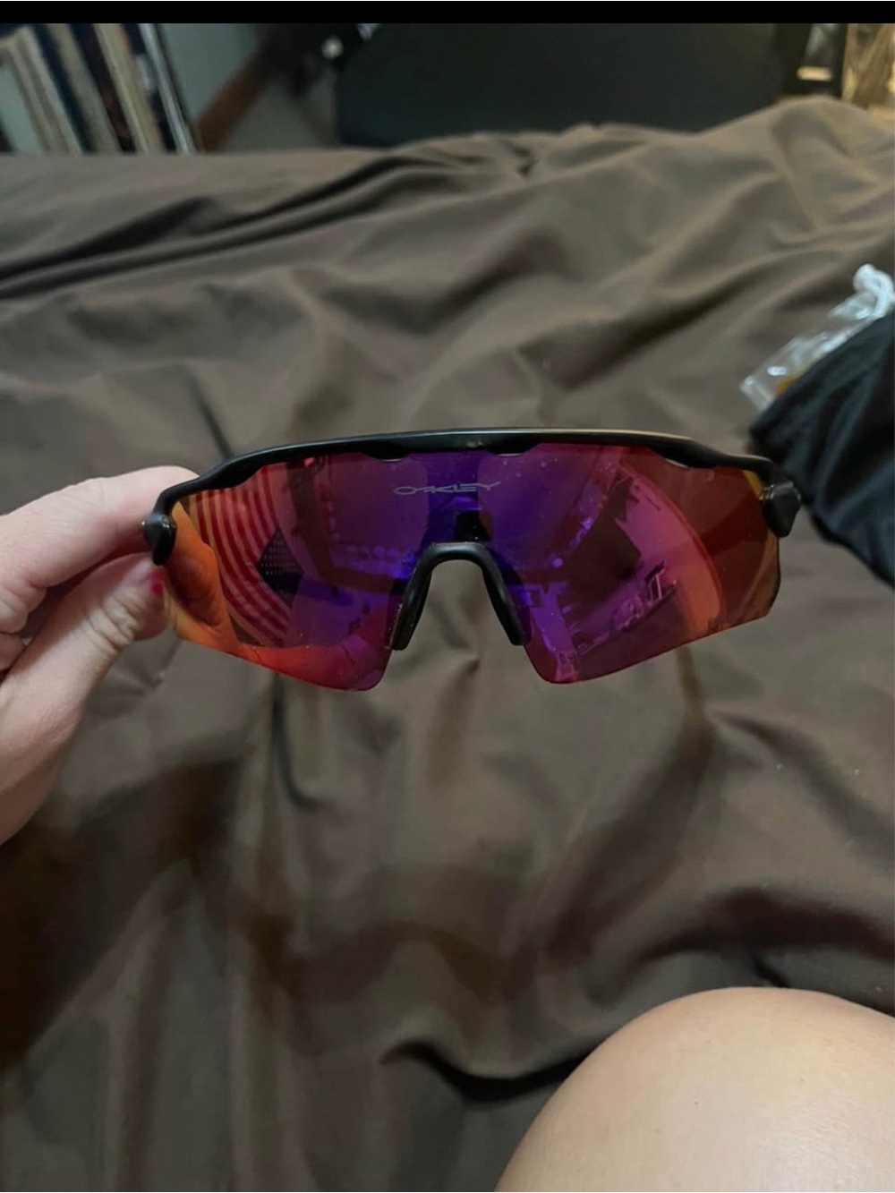 Oakley Black Frame Sunglasses with Red-Purple Iridium Lens